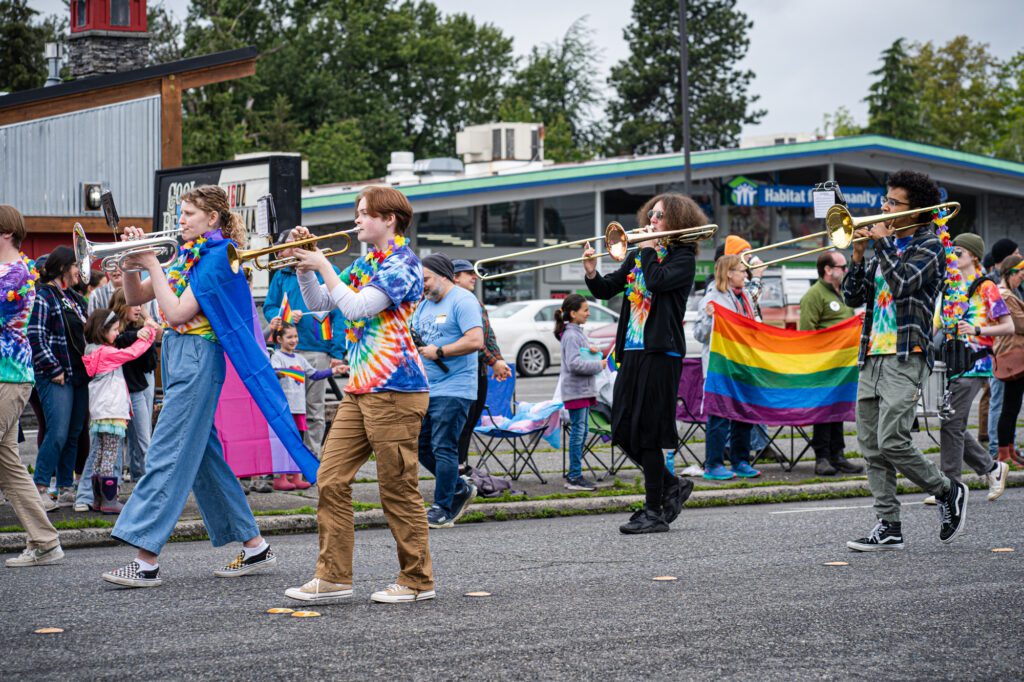 The Whatcom Youth Pride parade began on the corner of Halleck and Cornwall streets and featured a marching band playing "Born This Way" by Lady Gaga.