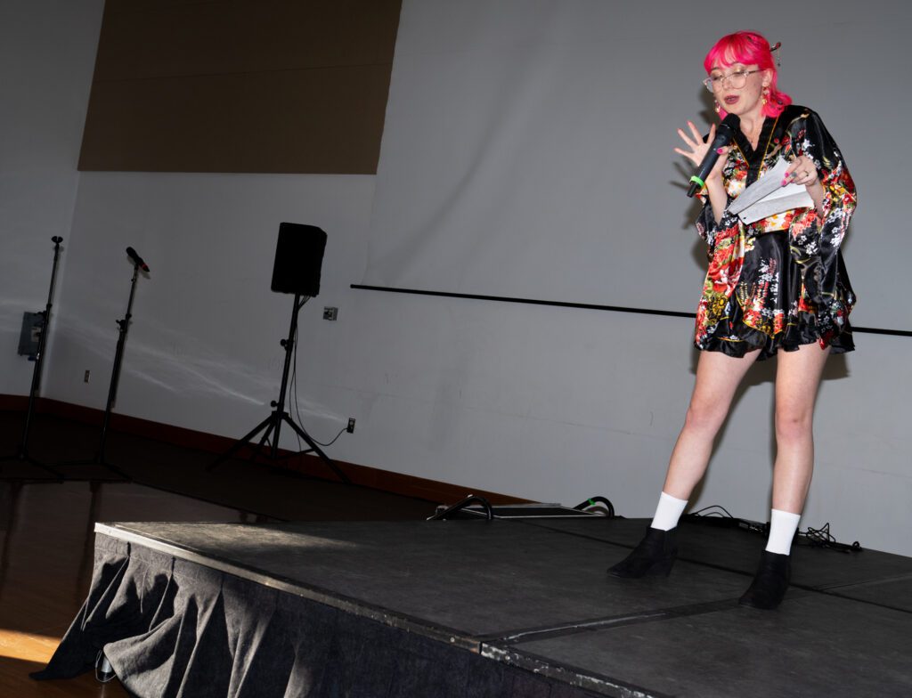 Charla Anne Larson sings a J-pop song while wearing a kimono from Okinawa, Japan, which is where her maternal family is from. Having a mixed background, Larson said she sometimes feels "not enough," but moments like these allow her to feel connected to her culture.