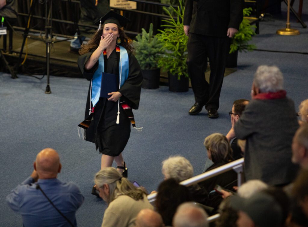 Emma Albarran Magnuson blows kisses to supporters in the crowd.