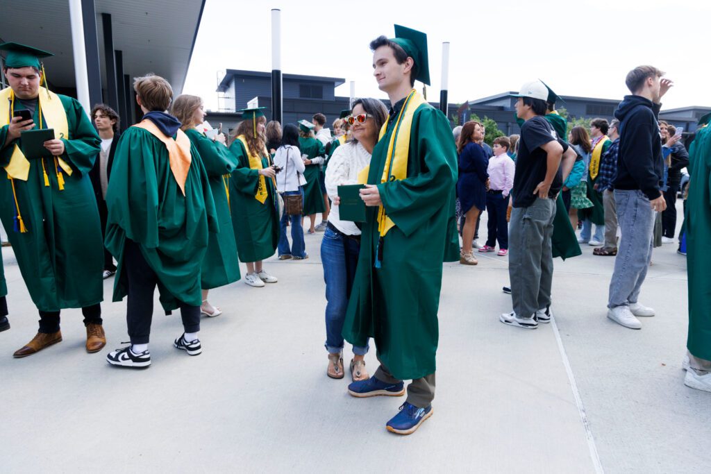 Carrie Blackwood poses for a photo with her son Alden Edison after the Sehome graduation.