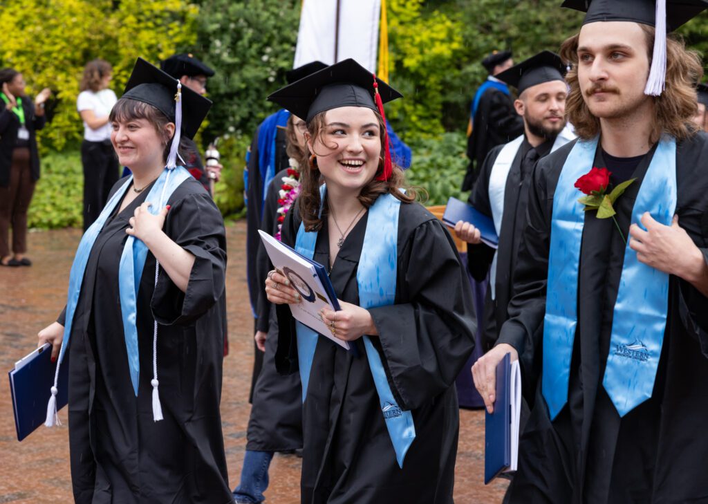 Graduate Jemma Alexander smiles while heading for Red Square.