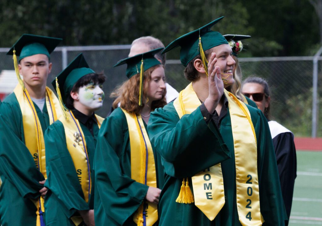 Jack Gosen waves to his family.