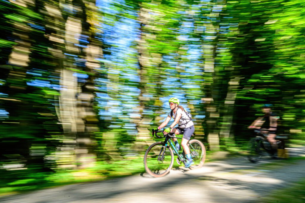 A pair of riders make their way down the Interurban Trail.