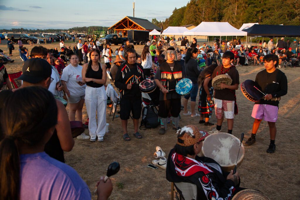 Tribal members sing, dance and create music together at Birch Bay State Park.