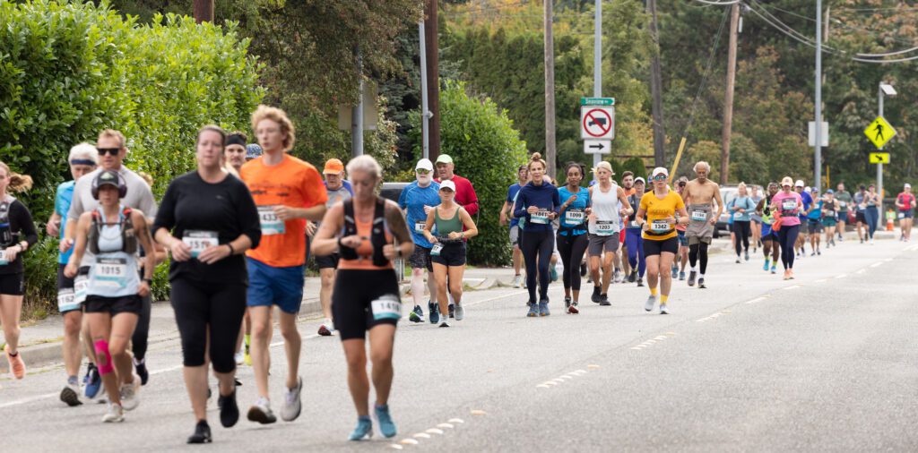 Half marathon runners head up Eldridge Avenue.