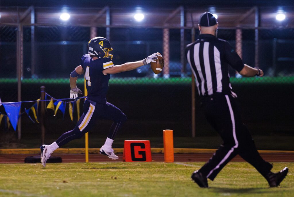 Burlington-Edison's Jakson Granger runs in for a touchdown Friday, Sept. 20 as the Tigers beat Mount Vernon 21-14 in the Battle of the Bridge game in Burlington.