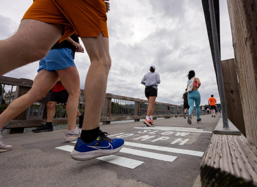 Runners pass eachother on Taylor Dock.