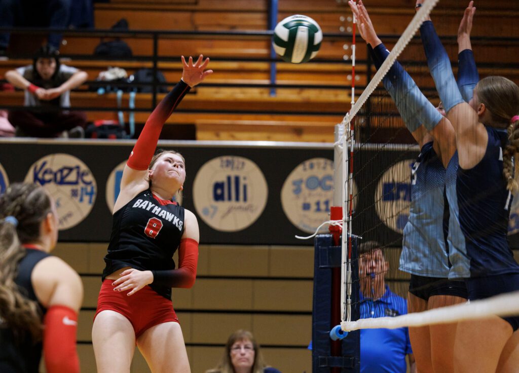 Bellingham’s Jayda Knutsen spikes the ball.