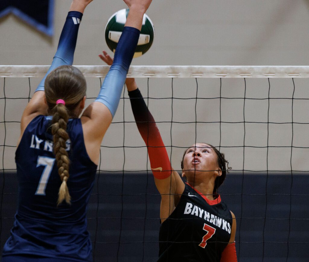 Bellingham’s Lilyauna Jude reaches for the ball at the net.