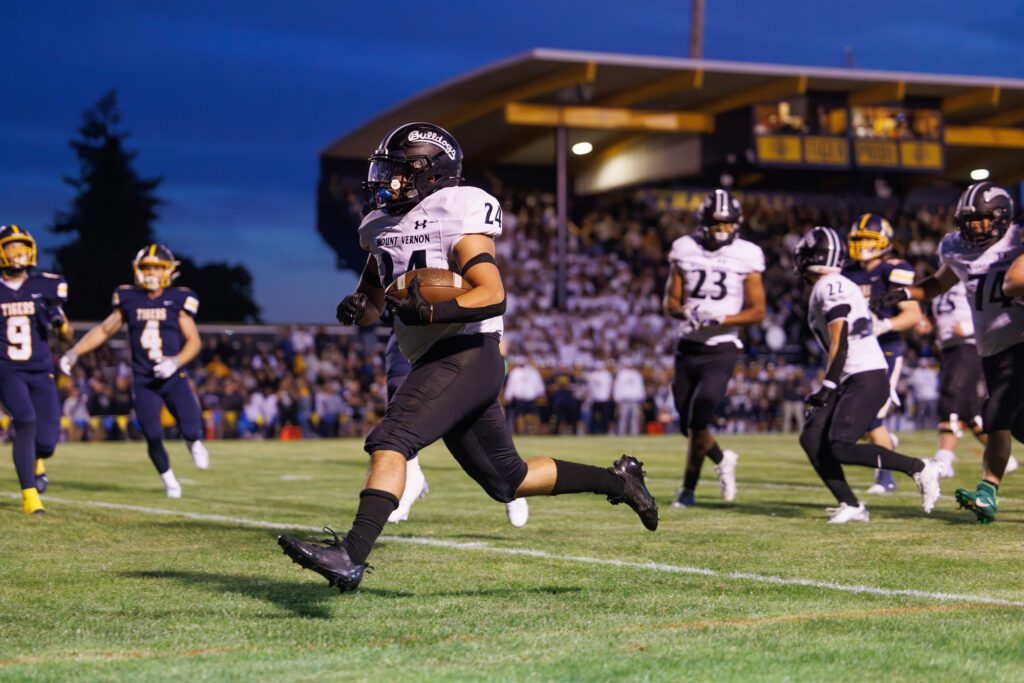 Mount Vernon's Diego Salaz runs in for one of his two touchdowns.