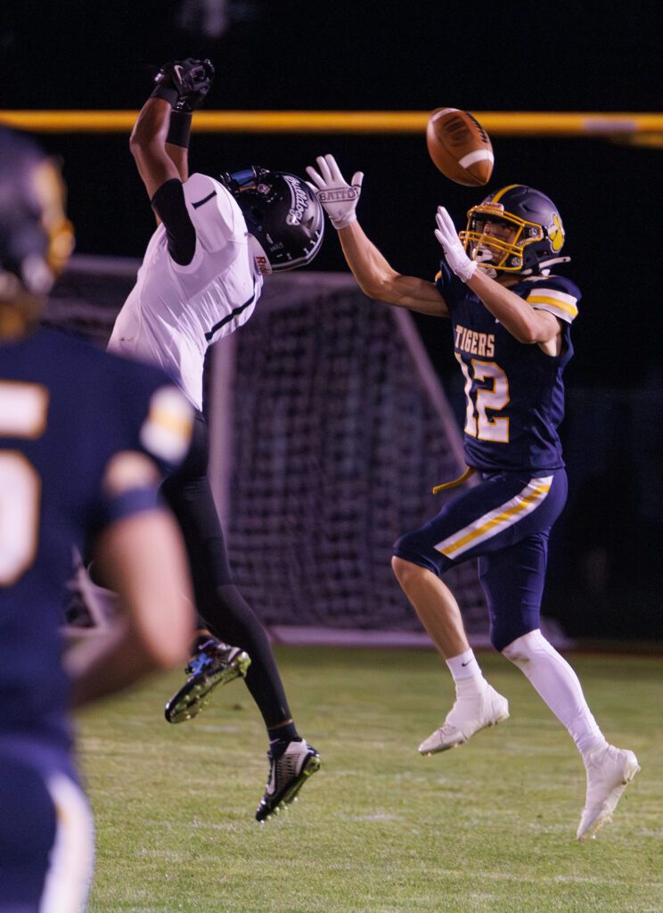 Mount Vernon's Michael Johnson breaks up a pass intended for Burlington-Edison's Jace Taxdahl.