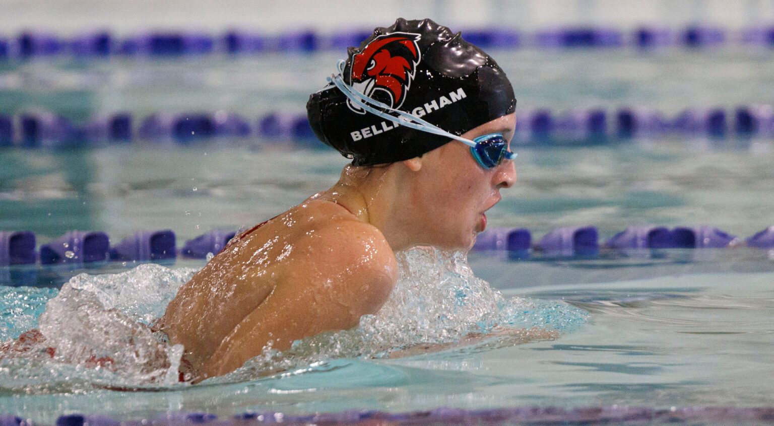 Bellingham’s Peyton Acord swims in the 100-yard breaststroke.