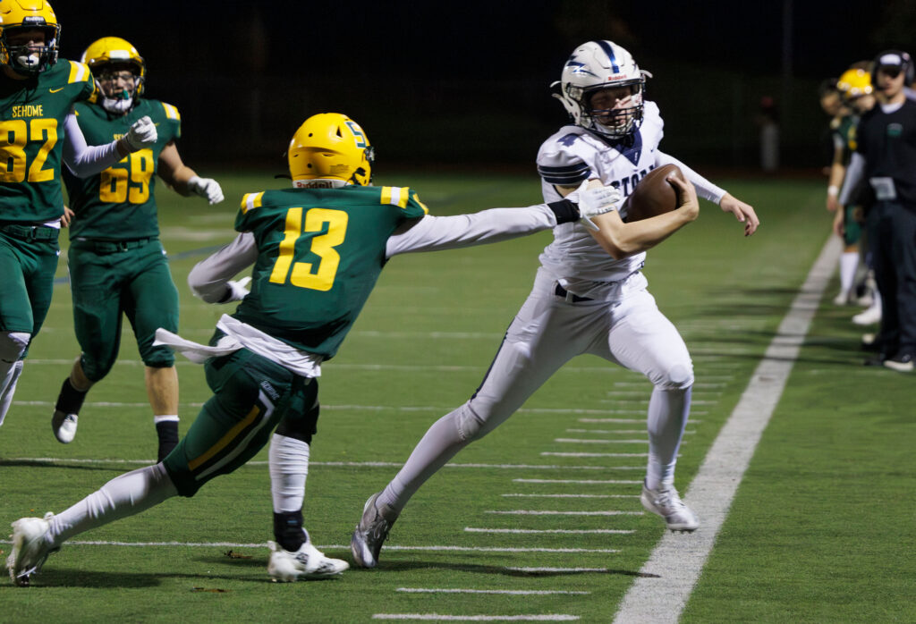 Squalicum's Donnell Hardin runs out of bounds in the fourth quarter.