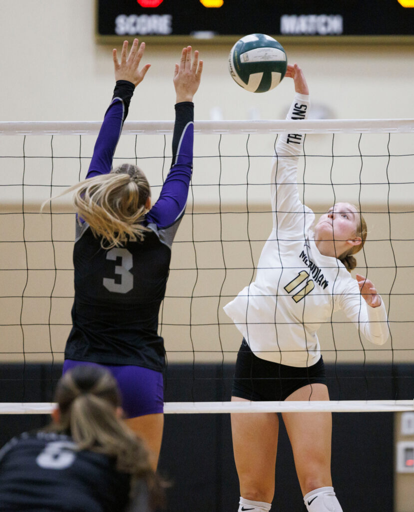 Meridian’s Melanie Short gets a kill against Nooksack Valley.