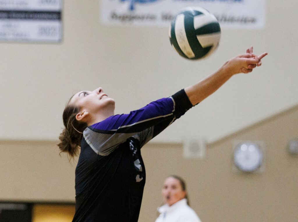 Nooksack Valley’s Annie Stremler bumps the ball back into play.