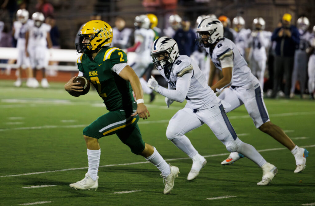 Sehome’s Nolan Wright finds some rushing yards Oct. 25 against Squalicum.