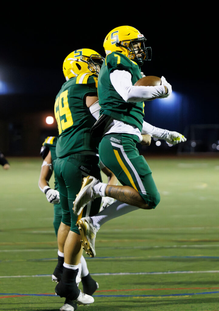 Sehome’s Andre Watson celebrates a touchdown with teammate Finn Sietz Gregoire.