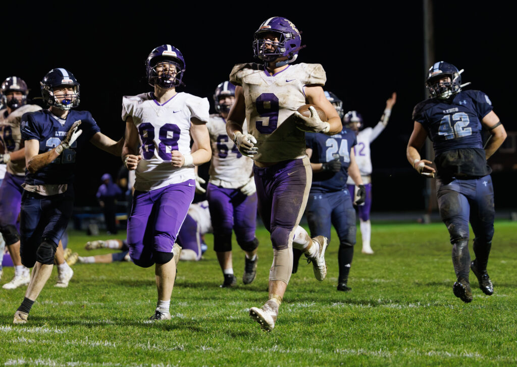 Nooksack Valley's Colton Lentz jogs in for his fifth touchdown on the night Friday, Nov. 1 to help the Pioneers clinch the 1A Northwest Conference title with a 32-7 road win over Lynden Christian.