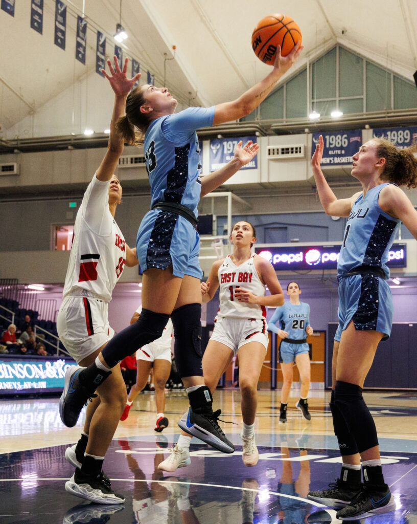 Western Washington University's Mason Oberg spins around to put the ball in the basket Tuesday, Nov. 12 as the Vikings beat Cal State East Bay 84-59 oat Carver Gym.