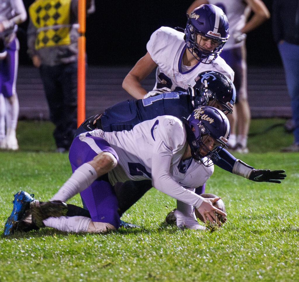 Nooksack Valley's Jaxon Hester grabs the ball after Lynden Christian fumbled a kick return.