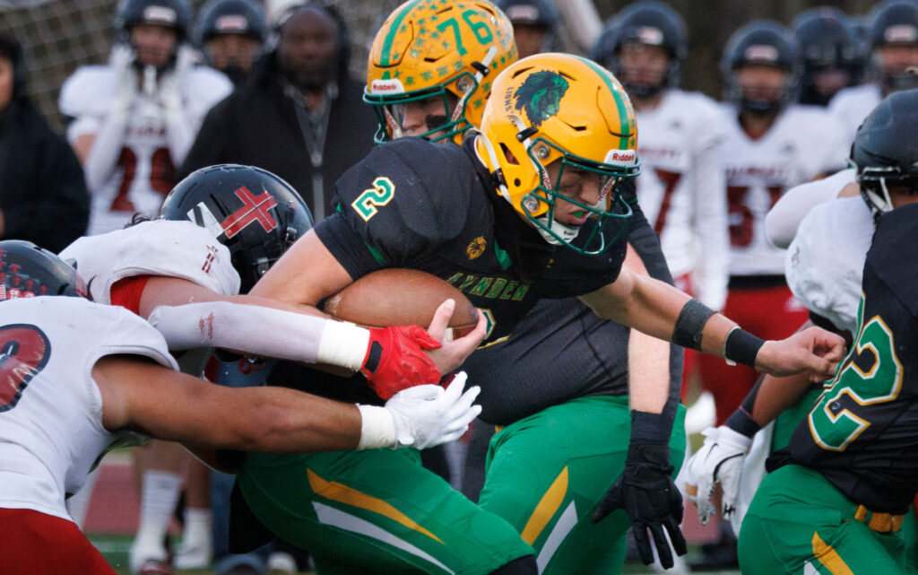 Lynden’s Brant Heppner fights his way for a couple yards.