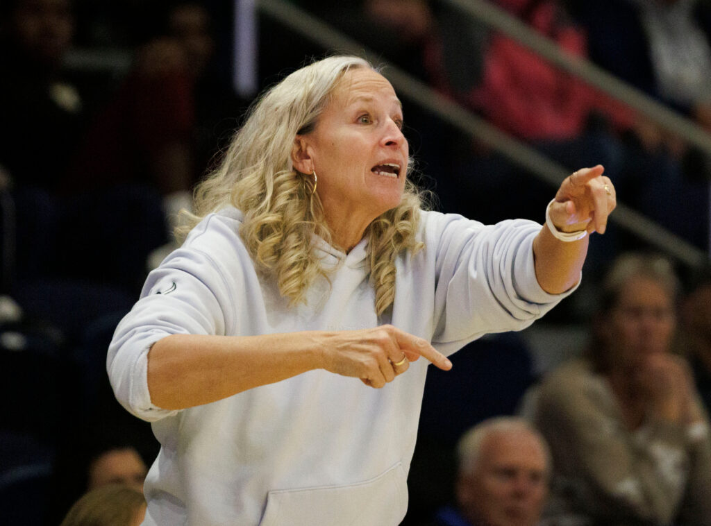 Western head coach Carmen Dolfo yells instructions to her players.