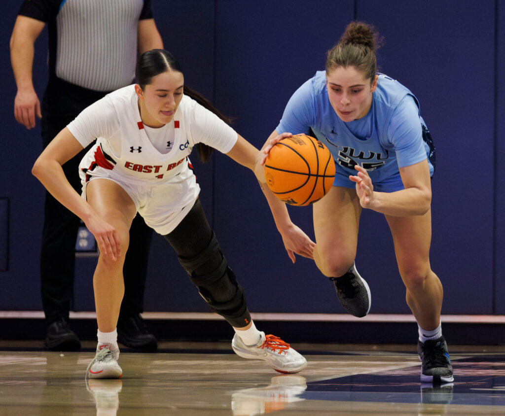 Western's Maddy Grandbois steals the ball from a Cal State East Bay player.