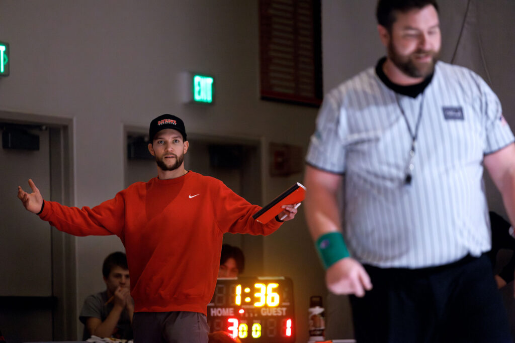 Bellingham head coach Tylor LaBelle disputes a call during a match of a double dual with Lynden, Mount Vernon, Mount Baker and Bellingham on Wednesday.