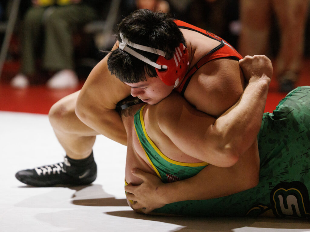 Bellingham's Sonny Powell pins his Lynden opponent during a double dual with Lynden, Mount Vernon, Mount Baker and Bellingham on Wednesday.