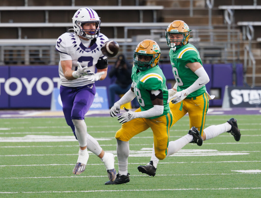 Anacortes senior Brady Beaner hauls in a pass for a first down.