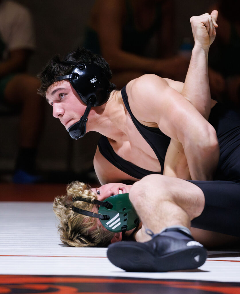 Mount Baker's Silas Maple pins Lynden's Lincoln Spoelstra at a double dual with Lynden, Mount Vernon, Mount Baker and Bellingham on Dec. 4 in Bellingham.