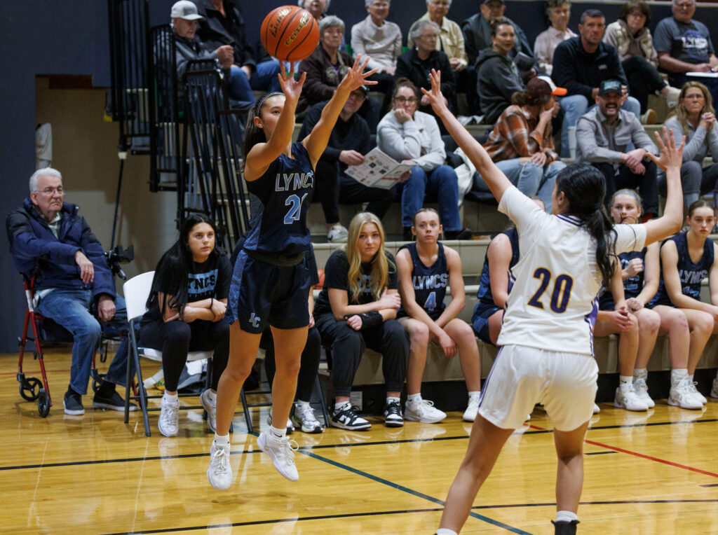 Lynden Christian’s Kayla Yun shoots a corner 3-pointer.