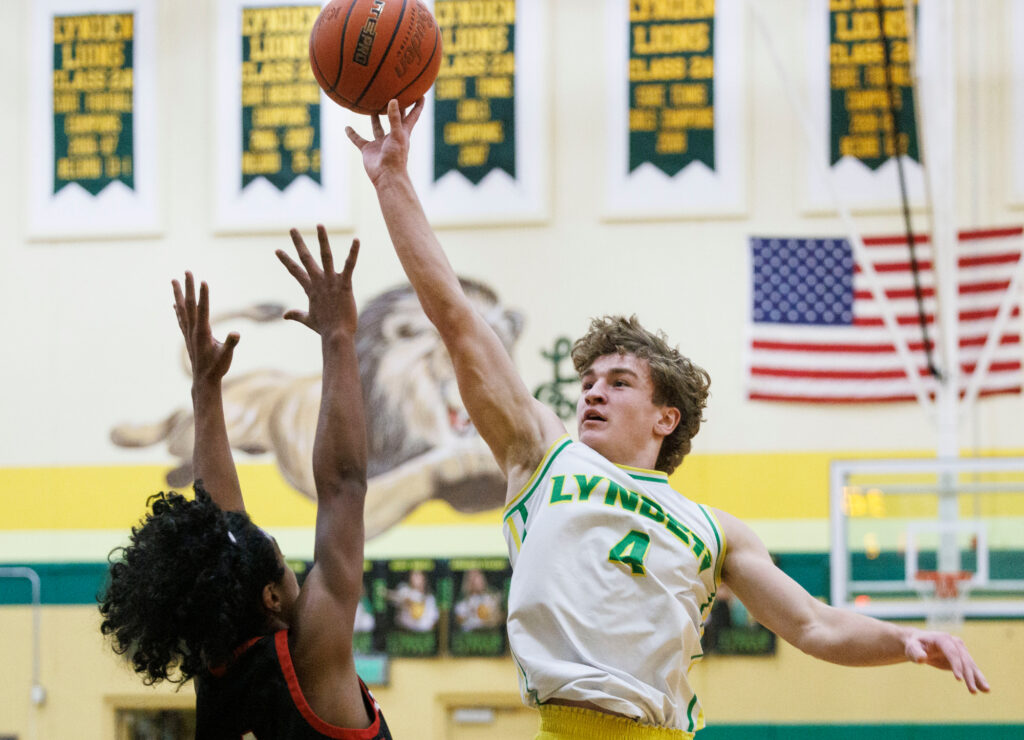 Lynden’s Brody Price leaps for a floater Dec. 30 during a 61-39 win over Archbishop Murphy at Jake Maberry Gymnasium in Lynden.