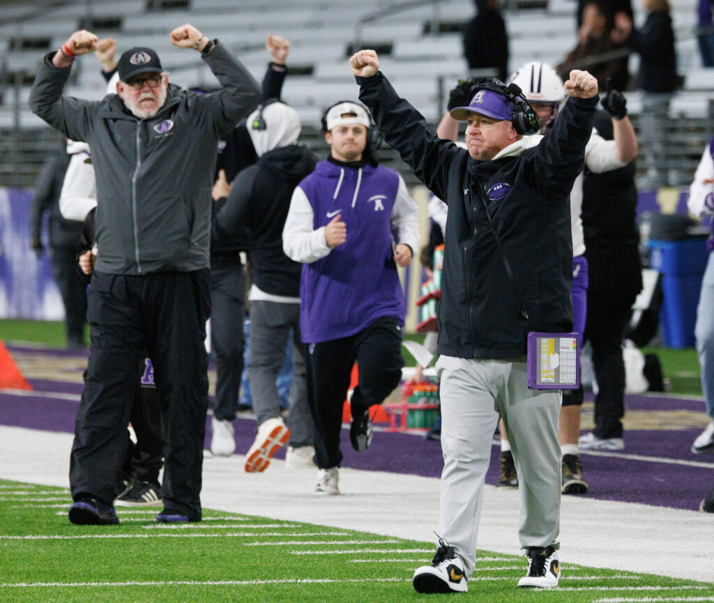 Anacortes head coach Justin Portz celebrates after the Seahawks stopped Tumwater on a fourth-down attempt.