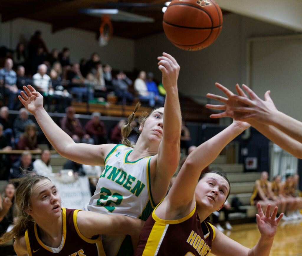 Lynden’s Finley Parcher reaches out for a rebound attempt.