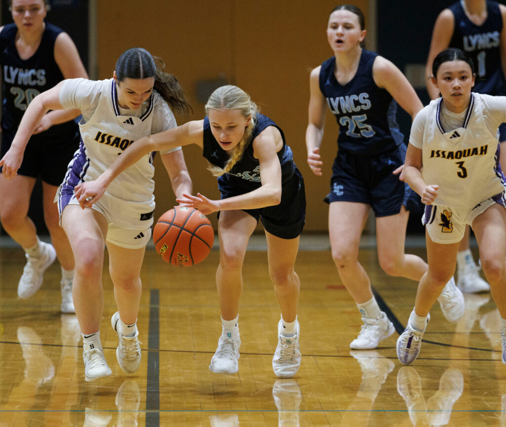 Lynden Christian’s Tyra Dykstra steals the ball and heads downcourt.