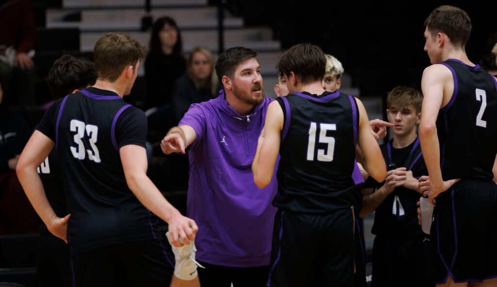 Anacortes head coach Brent Senff talks with his team during a timeout against Bellingham Dec. 19.