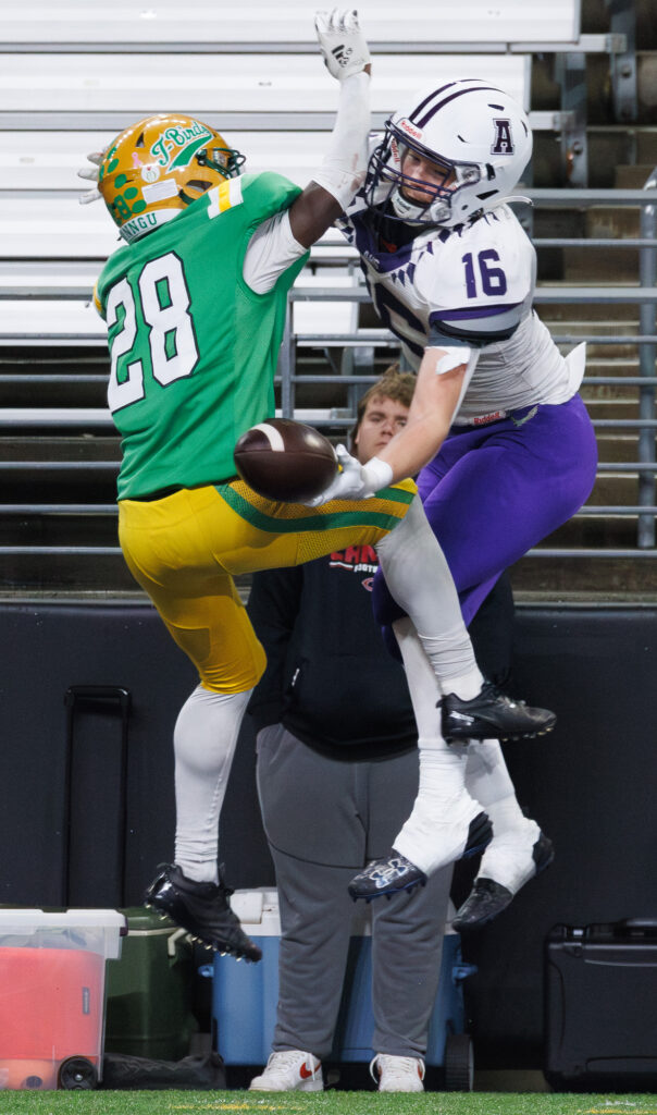 Anacortes junior Micah Dickison reaches for the ball but is unable to make catch.