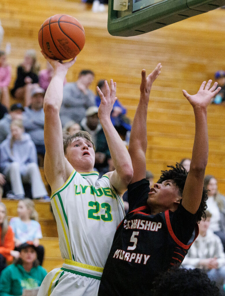 Lynden’s Ty Jorgenson takes a shot over a defender.