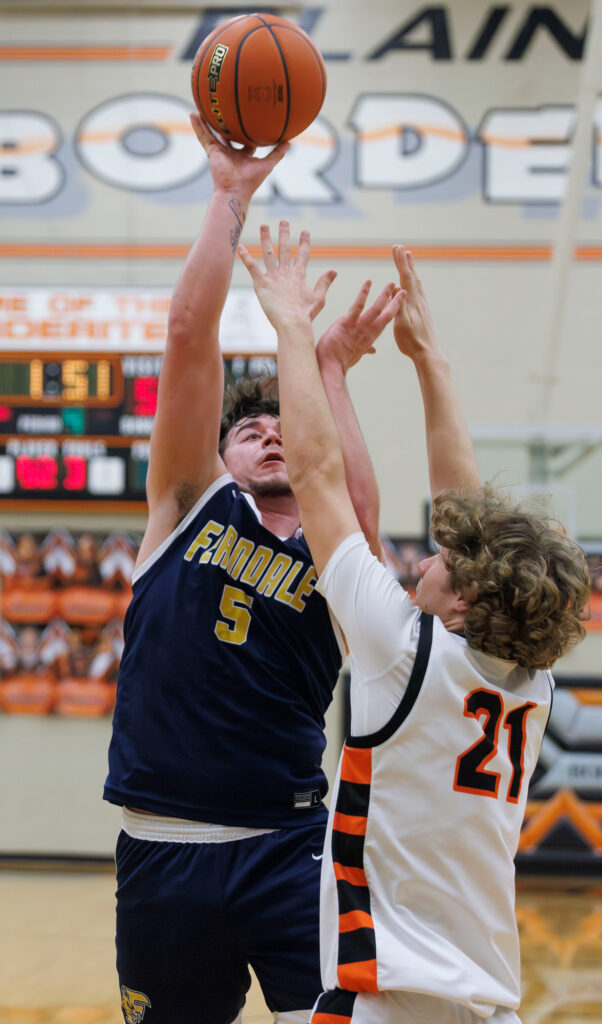 Ferndale’s Lincoln Thomas takes a shot under duress.