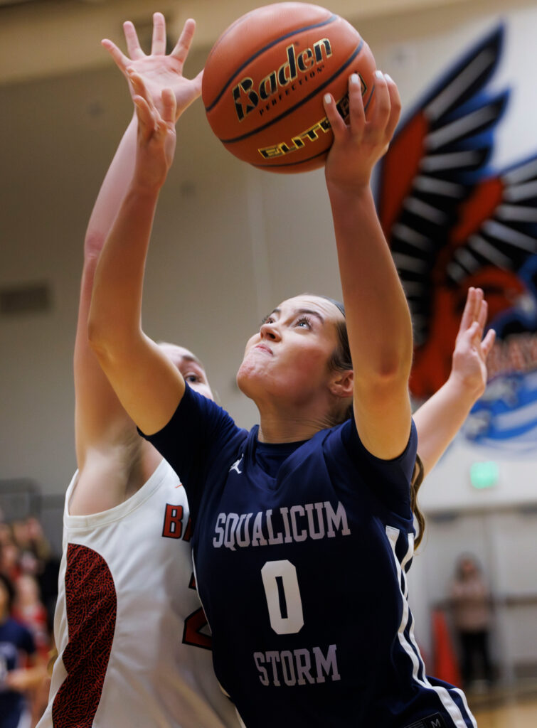 Squalicum’s Loretta Murphy-Kangas scores a basket late in the fourth quarter.