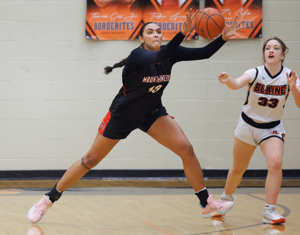 Mount Baker’s Rebeca Soares steals a pass intended for Blaine’s Brie Smith.