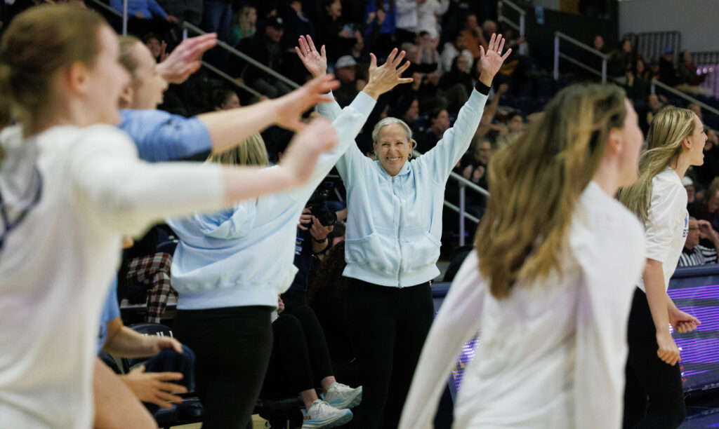 Western head coach Carmen Dolfo celebrates at the end of her 700th win.