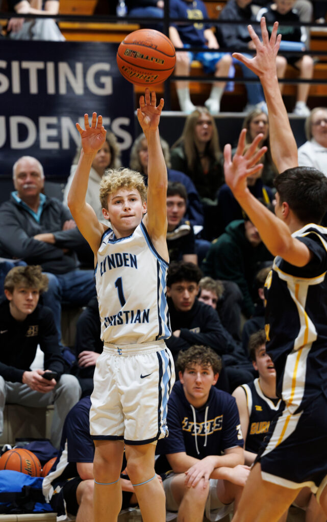 Lynden Christian’s Gunnar Dykstra makes a corner 3-pointer.