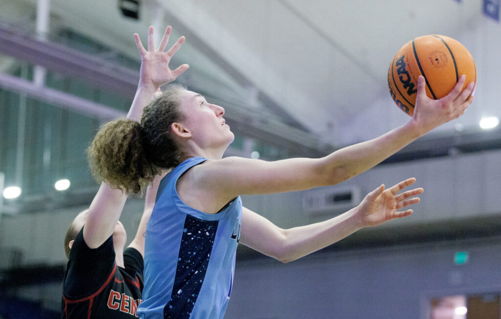 Western’s Olivia Wikstrom goes under the basket for a shot.