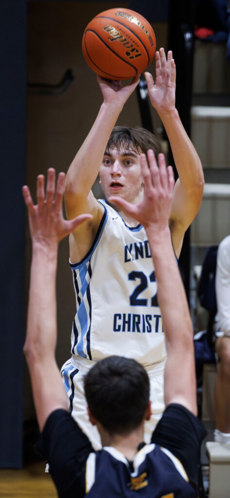 Lynden Christian’s Luke VanKooten rises for a 3-point shot.