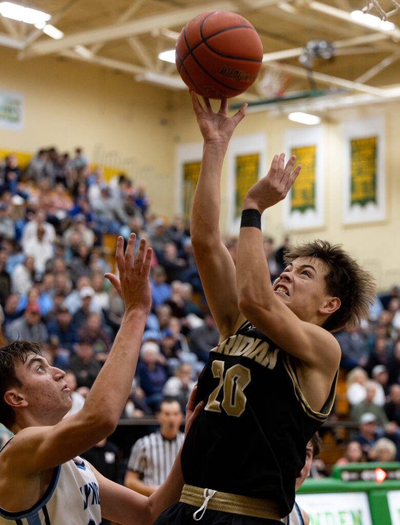 Meridian sophomore guard Trey Alexander puts up a shot.