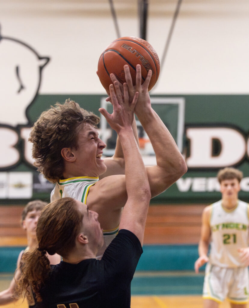 Lynden junior guard Brody Price gets fouled as he takes a shot.