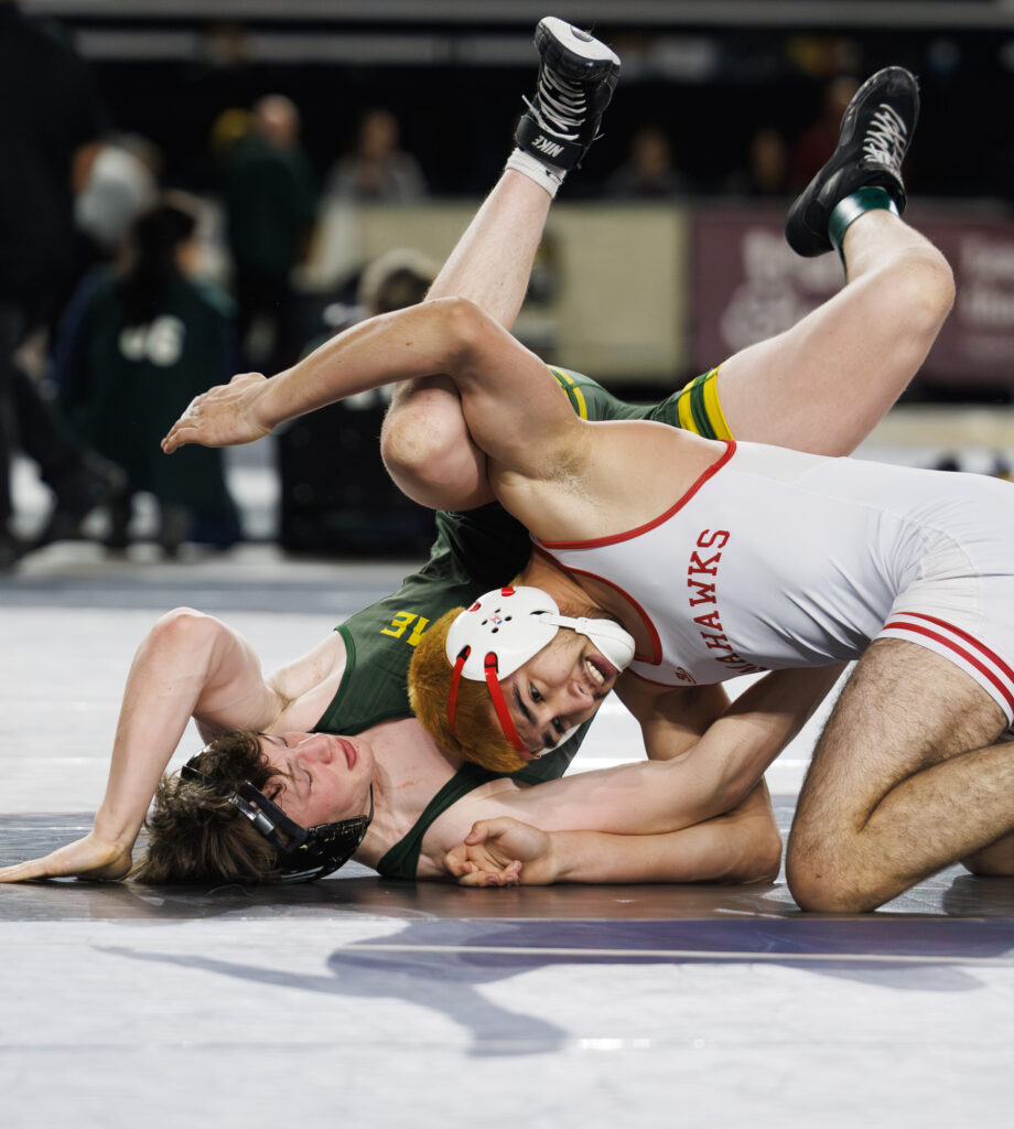 Sehome’s Grant Oliver rolls out of a hold from his opponent.