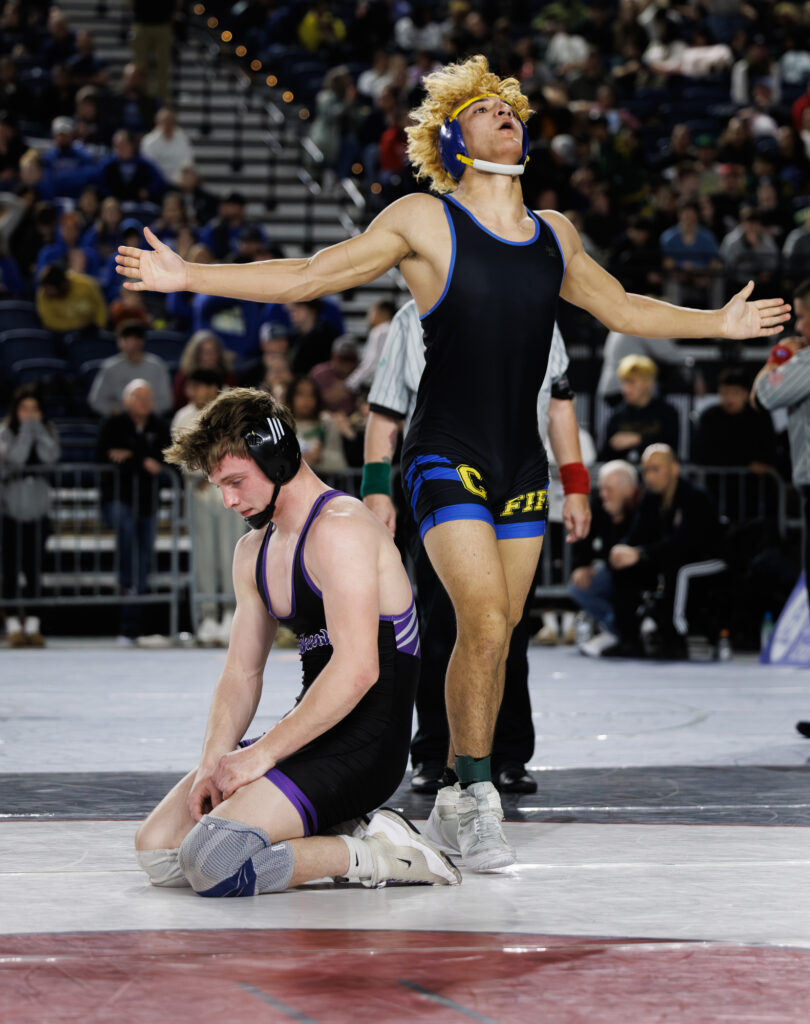 Fife’s William Conroy celebrates beating Anacortes’ Rylin Lang in a semifinal match.